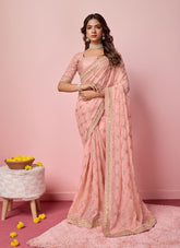 Exquisite looking peach colour saree